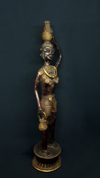 Bastar Woman with Tumba Statue 