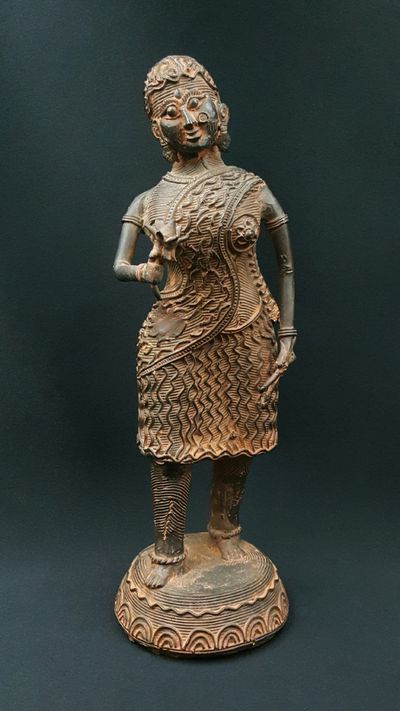 Woman with flower statue 